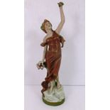 A Royal Dux figurine of a woman holding a rose aloft #2080 - 29cm high Further