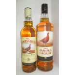 A one litre bottle of The Famous Grouse blended Scotch Whisky and a 70cl bottle of The Famous