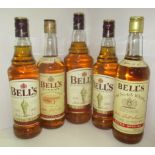 A one litre bottle of Bell's blended Scotch whisky, a 75cl bottle of Bell's Old Scotch Whisky,