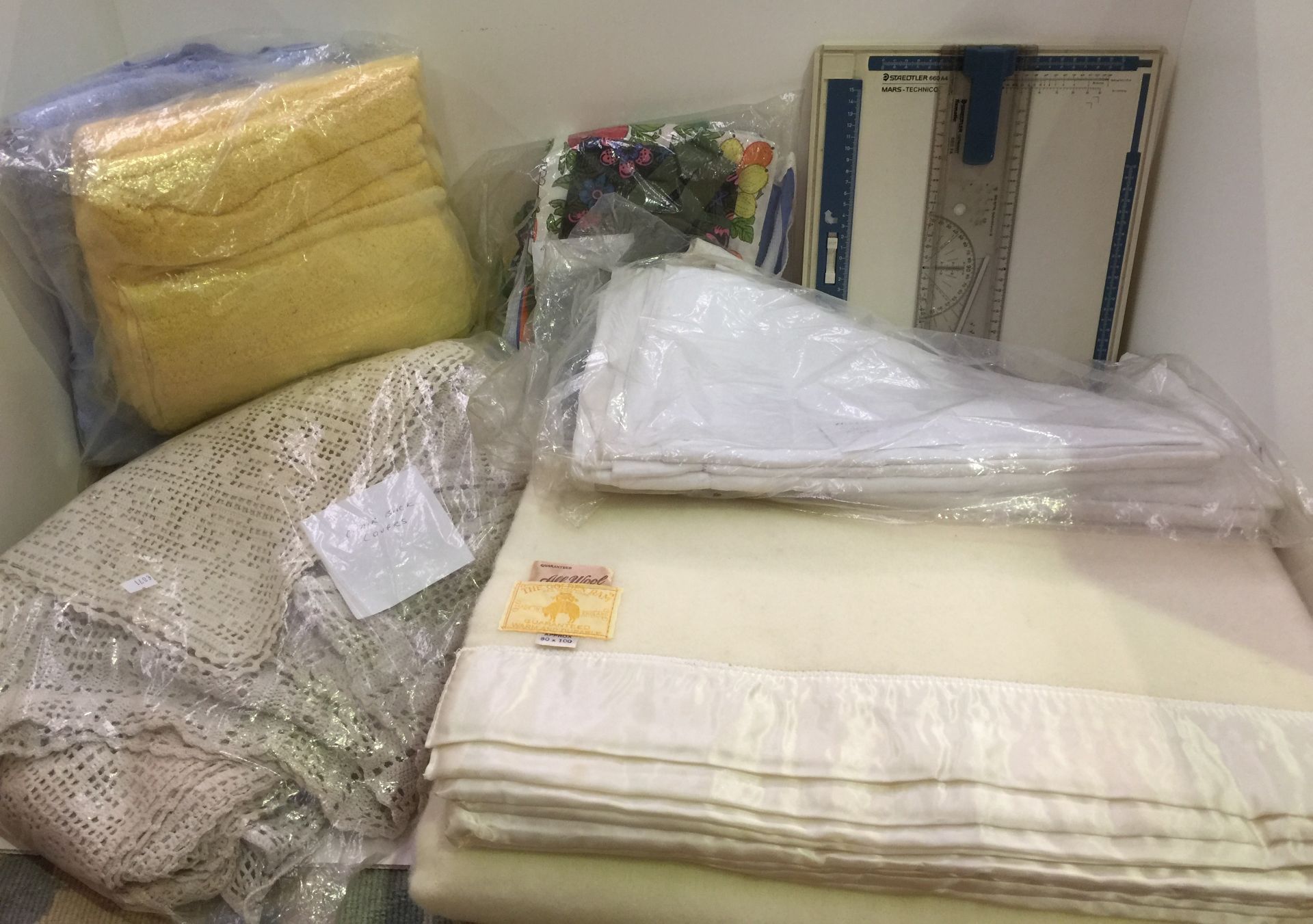 A large lot containing woollen blankets,