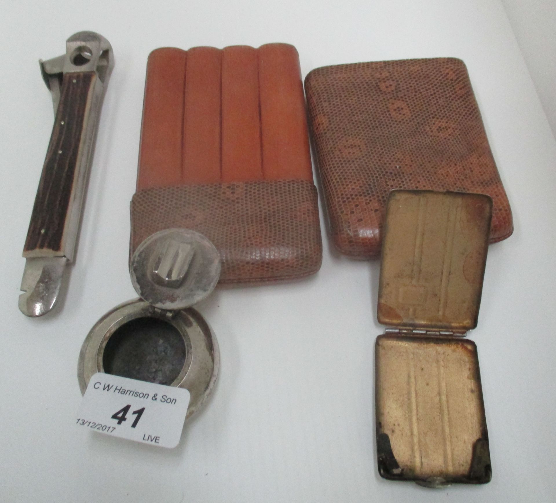 A cigar case, cigar cutter,