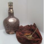 A 75cl Spode brown pottery liqueur bottle containing 26 2/3 fl oz./75.