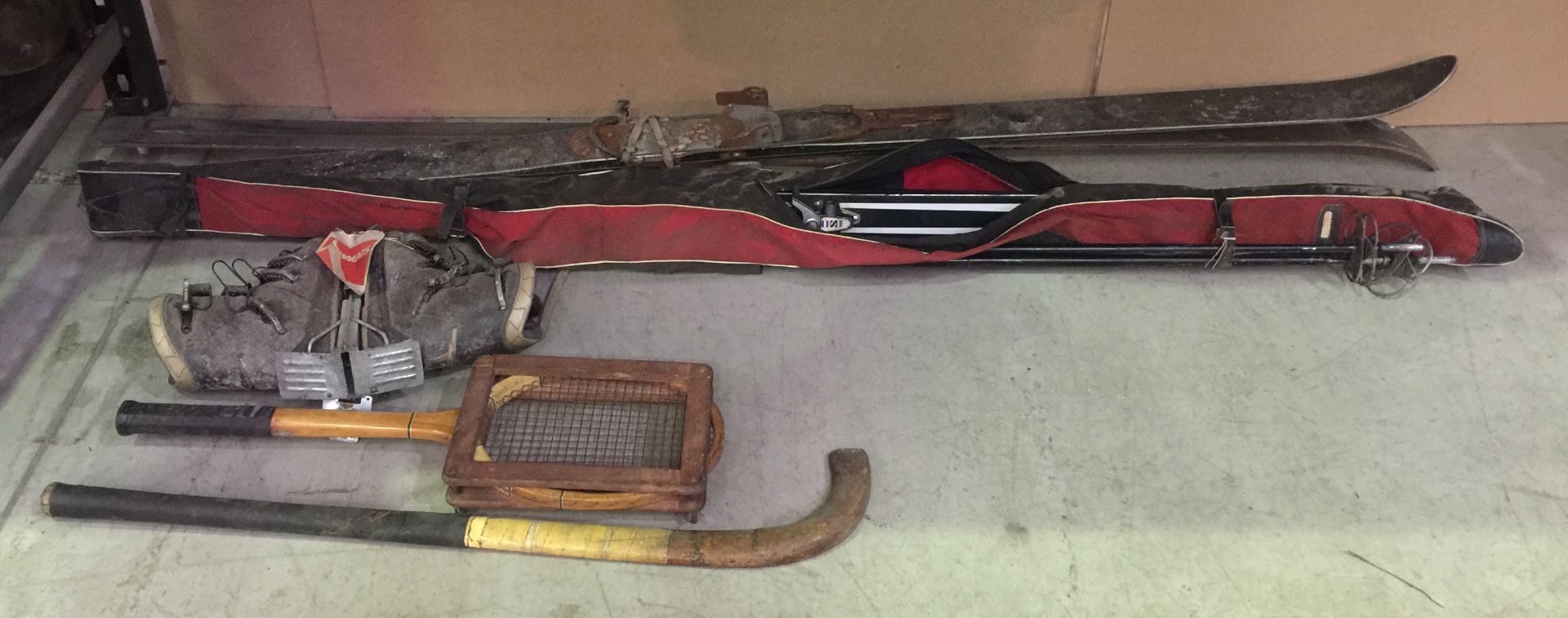 1 x hockey stick, tennis racquet and frame, pair of ski boots,