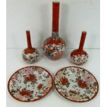 Five pieces of Satsuma ware comprising of three vases and two small plates