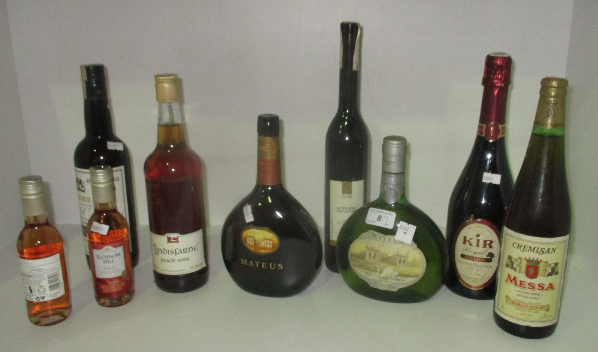 A mixed lot of wet stock comprising 2 x 750ml bottles of Mateus wine [white and rose],