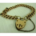 A 9ct gold curb link bracelet with padlock fastening (total approx weight 13.