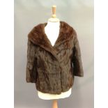 Short dark brown fur jacket