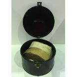 Circular tin hat box complete with 3 rolls of webbing