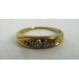 An 18ct gold five stone diamond ring (total approx weight 2.