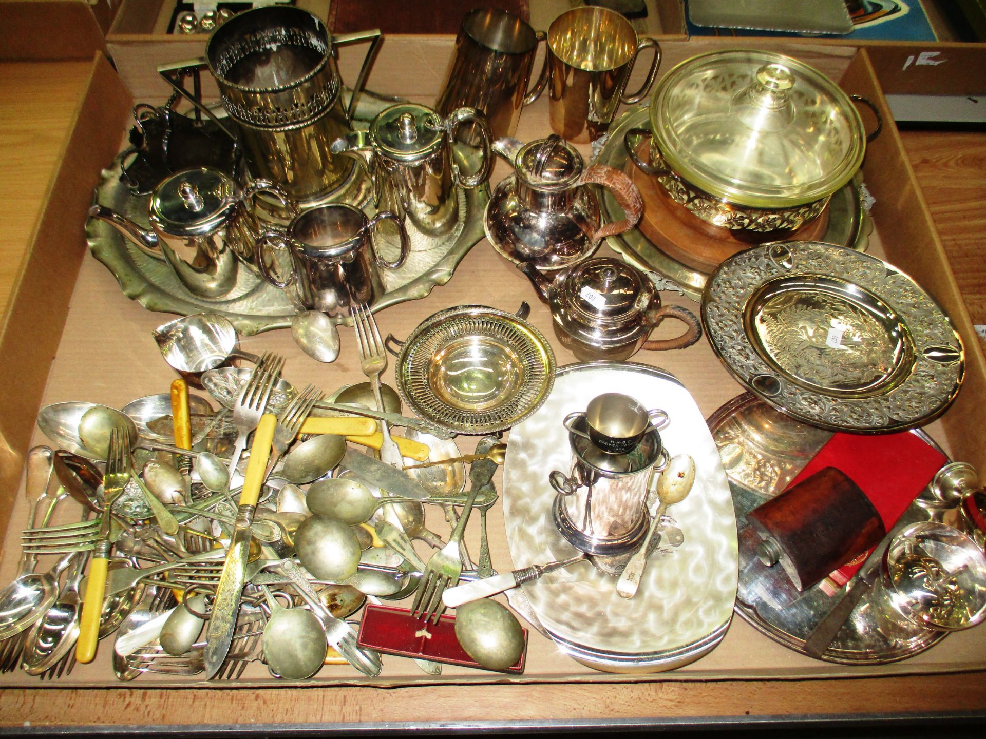 A quantity of plated ware including a 3 piece Walker and Hall tea service, trays, W.