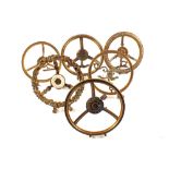 Six early 19th Century folding circular fire front brass trivets,