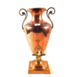 A tall 19th Century Copper samovar with twin scroll handles, square platform base and Brass tap,