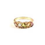 A 9ct Gold Amethyst, Topaz and Peridot set ring,