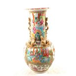 A 19th Century Cantonese figure painted vase with applied gilt dragon mouldings (restored top),