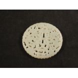 A Chinese carved Jade double happiness circular pendant