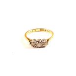 A Gold three Diamond ring,