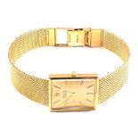 A gents 18ct Gold Rolex dress watch with rectangular dial on mesh bracelet,