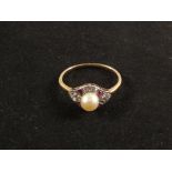 An 18ct Gold Platinum set Diamonds, Rubies and Pearls ring,