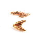 A pair of 9ct Gold foliate engraved torpedo shaped cufflinks