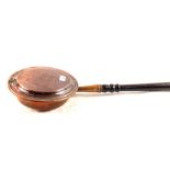 A Victorian Copper warming pan