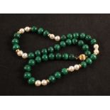 A Malachite and Pearl necklace interspaced with Gold beads with 14K Gold clasp