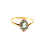 An 18ct Gold Diamond and green stone set ring,