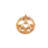 A 9ct Gold engraved Masonic pendant