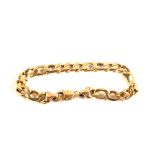 A gents 9ct Yellow Gold fancy curb link bracelet,