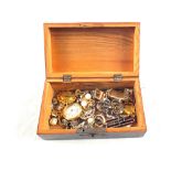 A box of mixed jewellery and watches