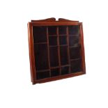 A glazed Mahogany hanging display cabinet