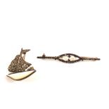 A Silver Marquesite and Mother of Pearl boat brooch plus one other Pearl set
