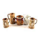 A 19th Century stoneware tyg with Silver plated rim plus four stoneware jugs (two as found)