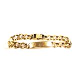 A gents 9ct Yellow Gold identity bracelet, engraved J.C.