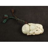 A Chinese carved Jade peach pendant