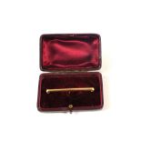 A 15ct Gold bar brooch