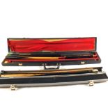 A Tom Newman 1370 billiards/snooker cue, an Ash and Rosewood cue with extensions,