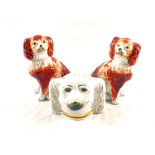 A pair of Victorian Staffordshire russet dogs plus a dog money box