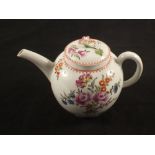 A Lowestoft polychrome Curtis pattern teapot, the cover with floral finial,