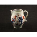 A Lowestoft sparrow beak jug with blue and red Redgrave two bird pattern decoration height 3 1/4,