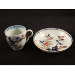 A Lowestoft polychrome floral Redgrave-The Green Root pattern cup and saucer, cup height 2 1/2",