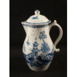 A Lowestoft blue and white lidded milk jug and cover with pagoda and landscape decoration, height 7"