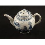 A Lowestoft blue and white teapot and cover with pagoda, fence and landscape decoration, height 6",