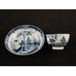 A Lowestoft blue and white tea bowl and saucer with pagoda decoration, tea bowl dia 3",