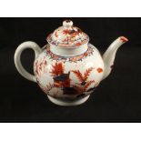 A Lowestoft red and blue doll's house and fern pattern teapot,