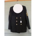 A Naval Officers dress jacket with cap