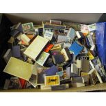 A large quantity of matchboxes,