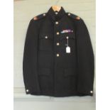 An Officers service jacket and trousers with dress jacket (Coldstream Guards)