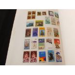 Three albums of world stamps and covers including Australia and New Zealand