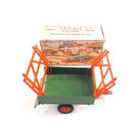 A boxed Britains two wheel tipping trailer with rubber tyres No.