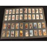 Seven Old Time albums containing sets and part sets of cigarette cards